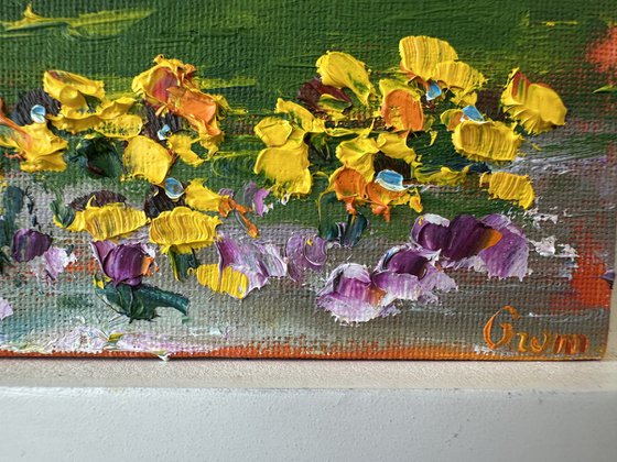 Orange sunset with flowers