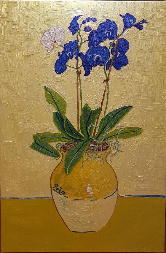 Vase with blue Orchids
