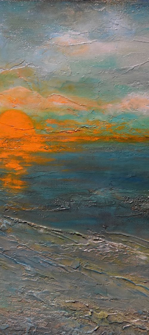 Sunset over teal waters by Tamara Bettencourt