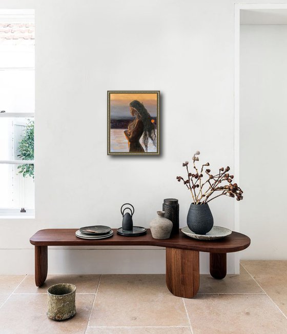 Naked woman by the river