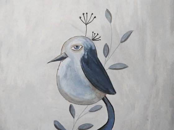 The blue bird with long tail