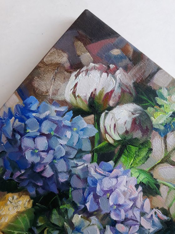 Blue hydrangea and peonies