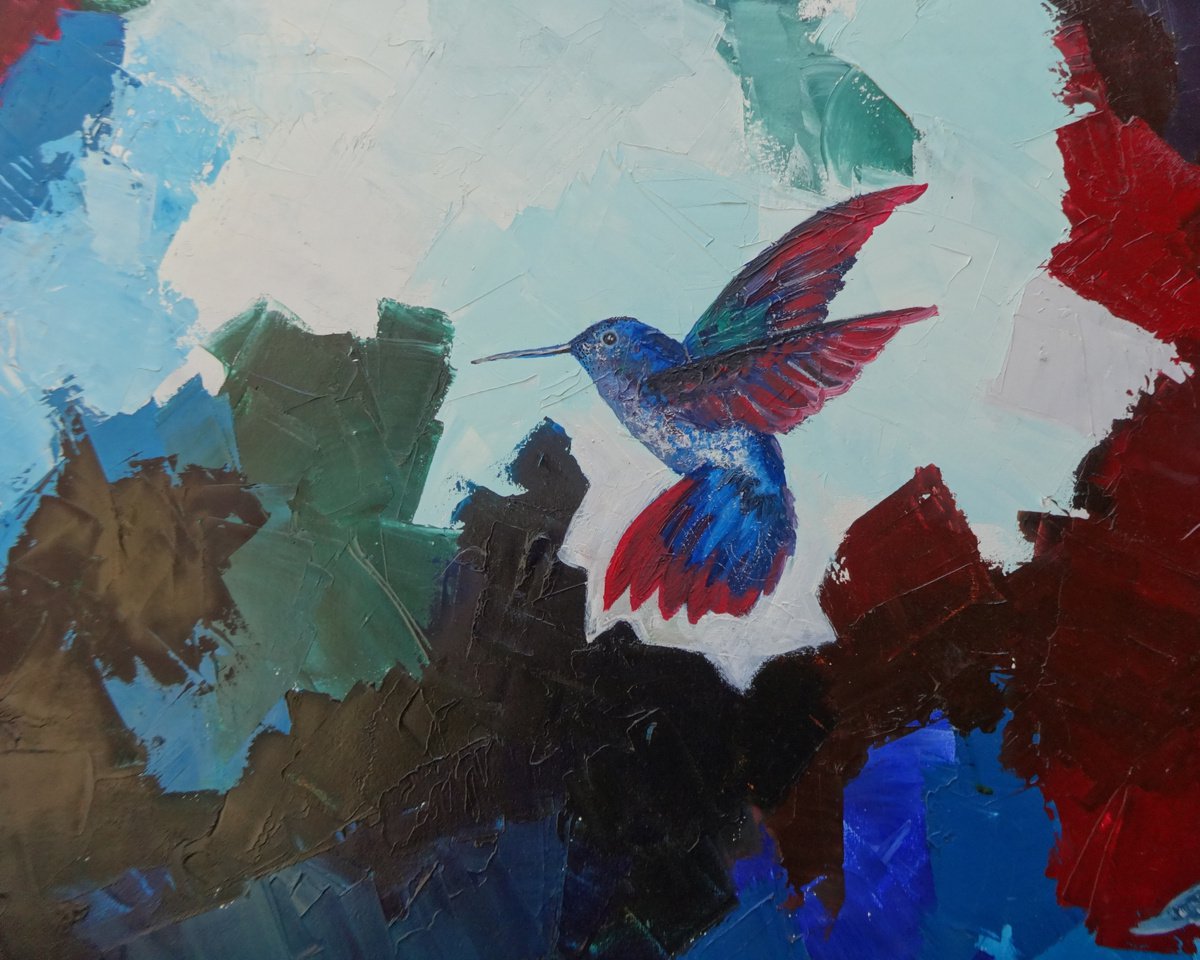 Hummingbird in flight by Olha Gitman