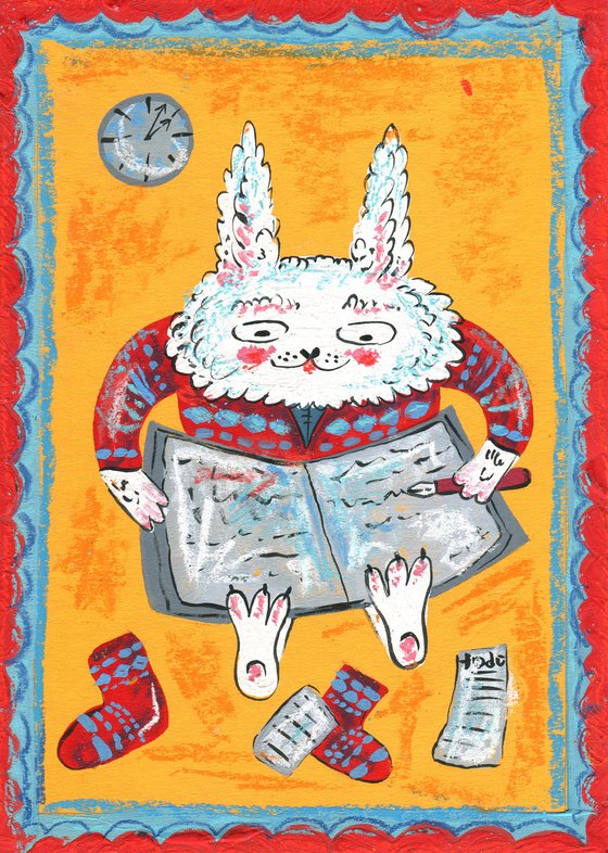 White bunny with a book