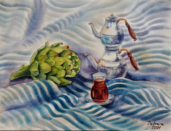 Turkish still life with tea and artichoke on a striped towel