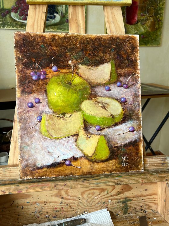 Green apples on dark
