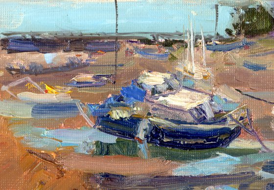 Fishing boats by the sea