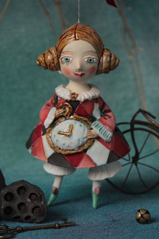 Little Girl in a harlequin dress. Hanging sculpture, bell doll by Elya Yalonetski