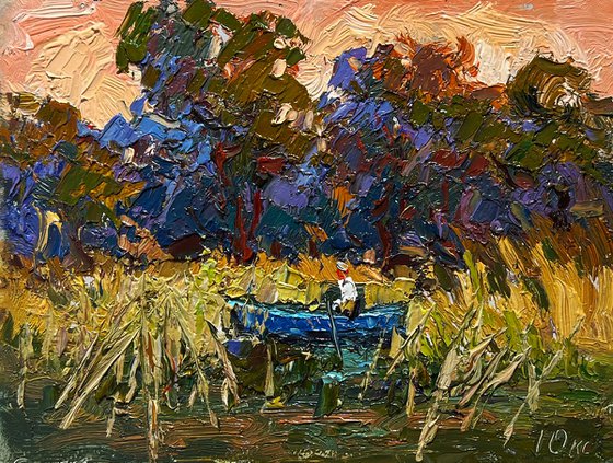 On a boat among the reeds