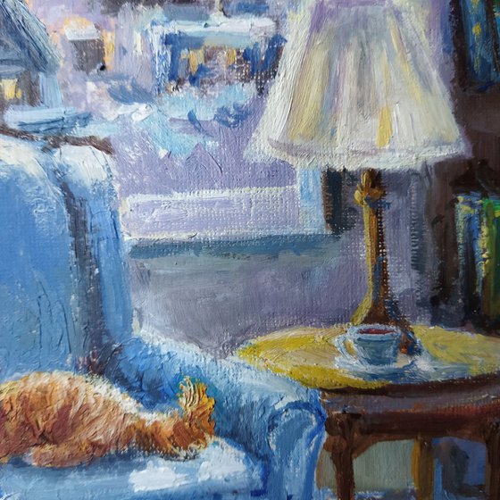 Ginger cat and armchair