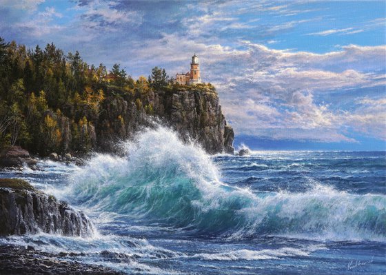 Lighthouse at the edge of the surf