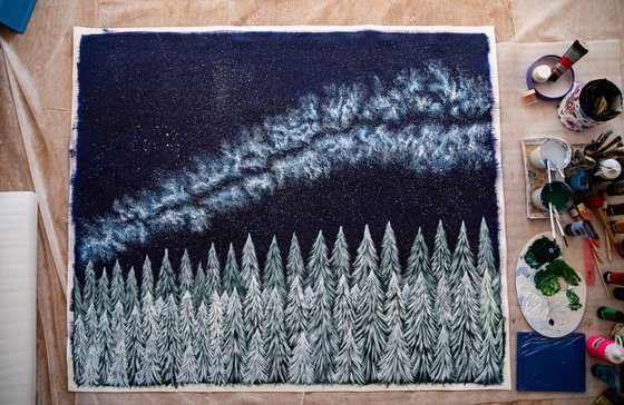 Starry night in winter woods