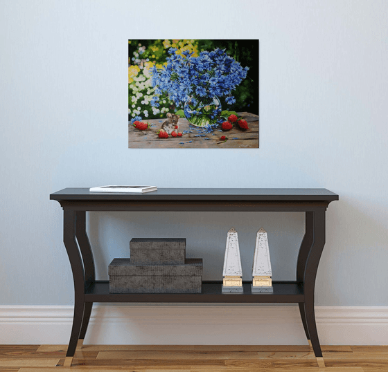 Still life with Blue Flowers and curious little mouse among succulent strawberries