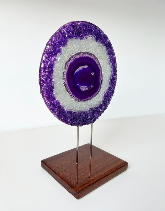 Amethyst framed in a glass circle