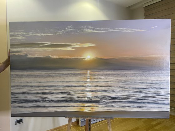 Golden Sunrise Over Calm Ocean