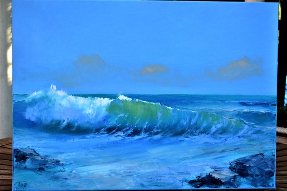 Seascape with transparent wave