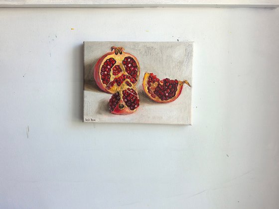 Pomegranate on white