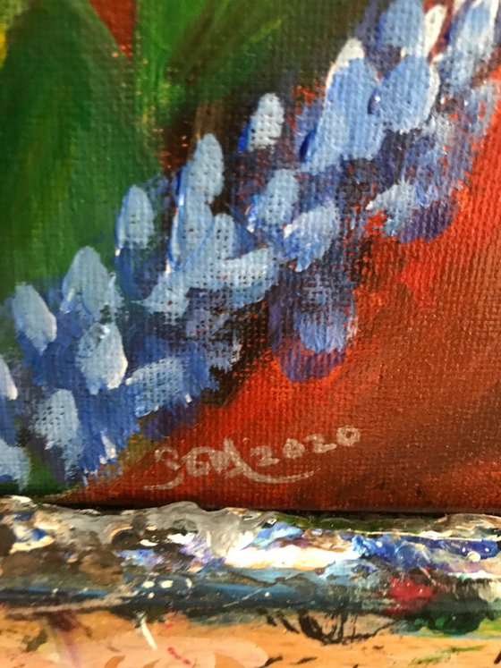 Sunflowers with blue salvia