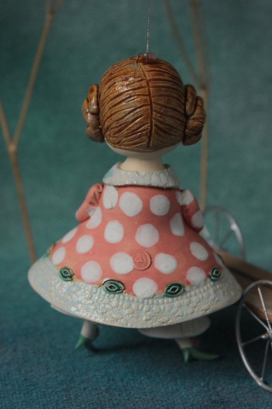 Little Girl with a teapot. Hanging sculpture, bell doll by Elya Yalonetski