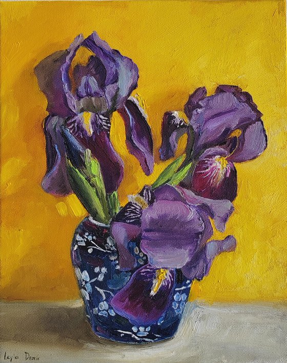 Purple iris bouquet on yellow