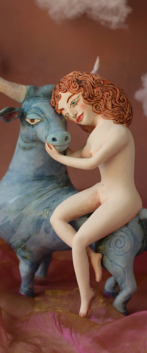 Riding your dreams. Girl on a blue ox by Elya Yalonetski