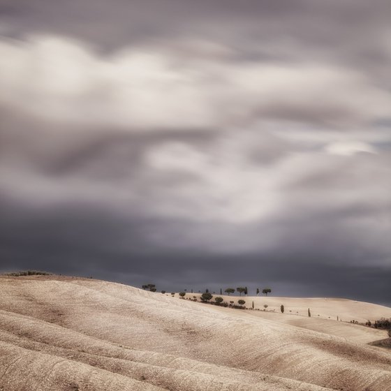 Tuscan rolling hills before the storm