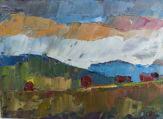 Cows on a hill