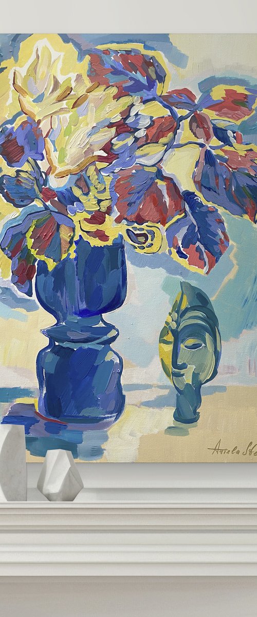 Geraniums And An Exotic Mask by Ariela Stem