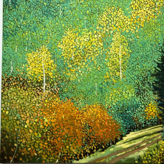 Green forest with yellow aspens