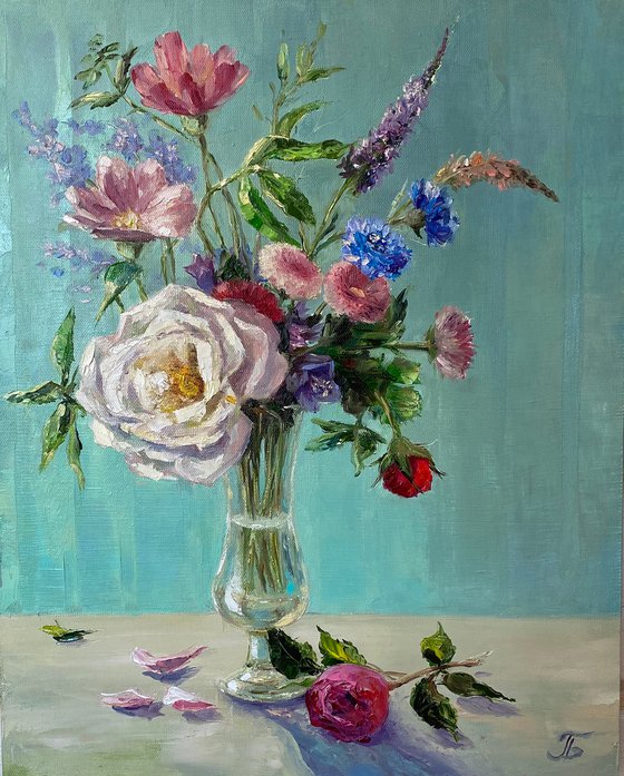 Still life with flowers. Turquoise background.