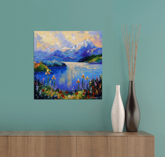 Flowers on the shore of a mountain lake