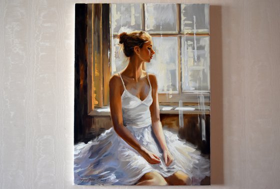 A ballerina at the window