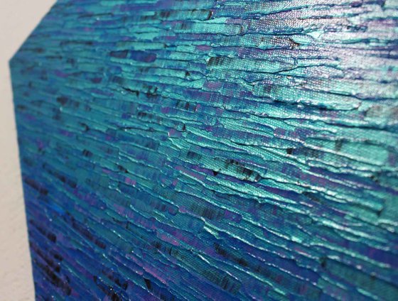 Blue iridescent purple knife texture