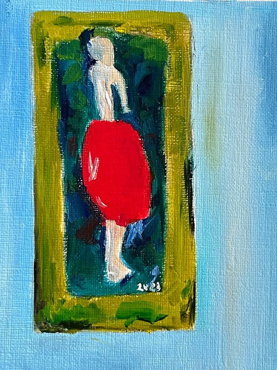 A woman in a red skirt