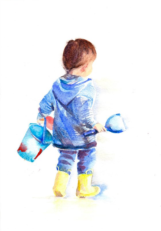 Child with bucket and spade