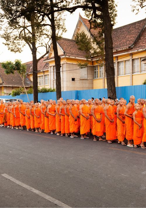 Monks procession in Phnom Penh by Tom Hanslien