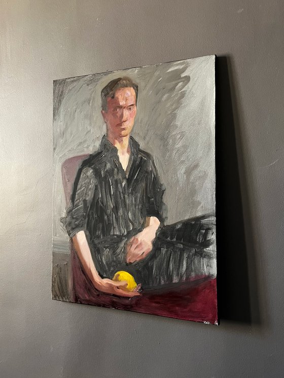 Portrait of a man with lemon