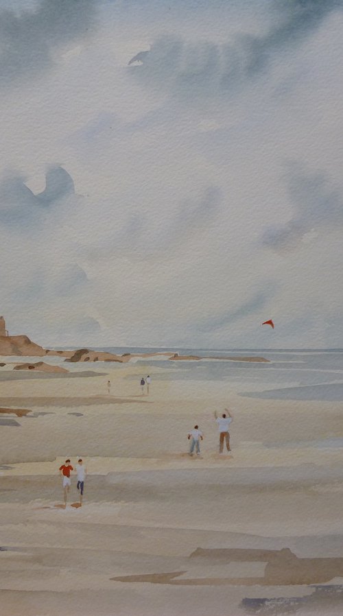 Flying a kite at Portmarnock by Maire Flanagan