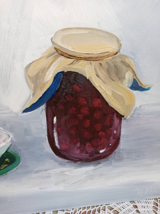 Still life with the cherry jam and the tea box