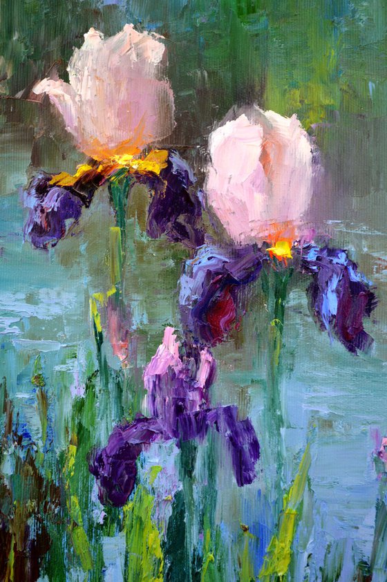 Three Irises by the pond