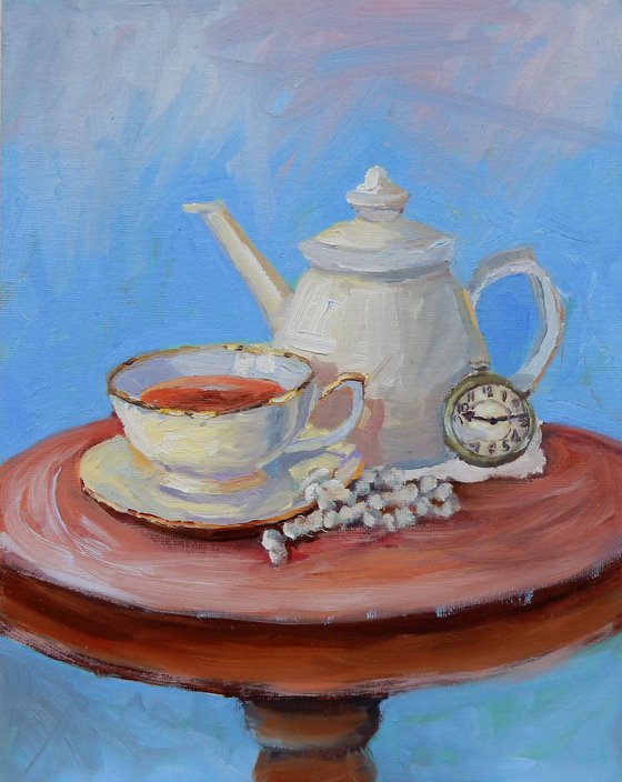 Teacup. Coffee pot.