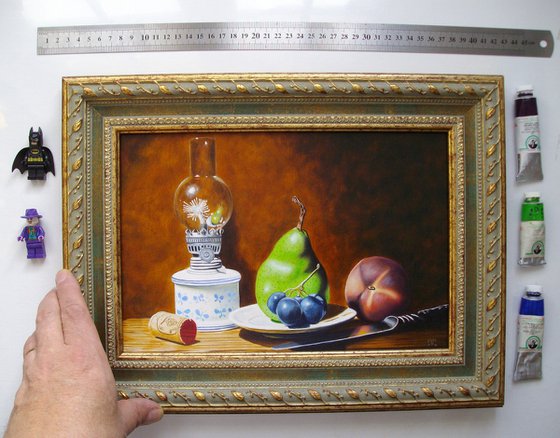 Oil lamp with fruits