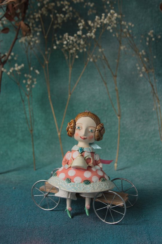 Little Girl with a teapot. Hanging sculpture, bell doll by Elya Yalonetski