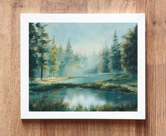 Misty lake in a pine forest