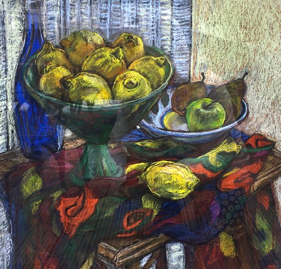 Rustic still life with Lemons and a colourful scarf