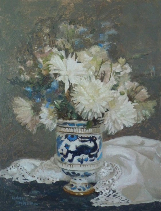 White flowers in a porcelain vase
