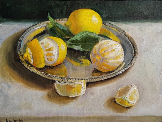 Lemon fruit slices on metal tray still life