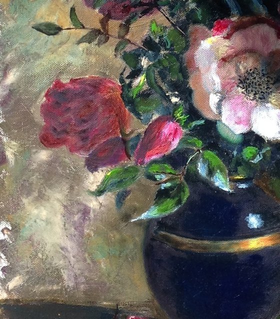 Vase with roses - pink and yellow roses in a blue vase