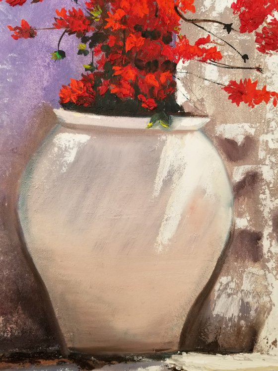 Red Flowers in a Vase. Bougainvillea.