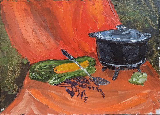 Сauldron and zucchini. Still life